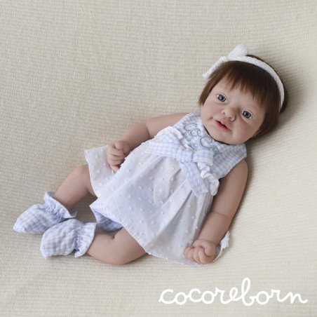 Luna, a girl with chocolate hair, blue eyes, and fair skin.