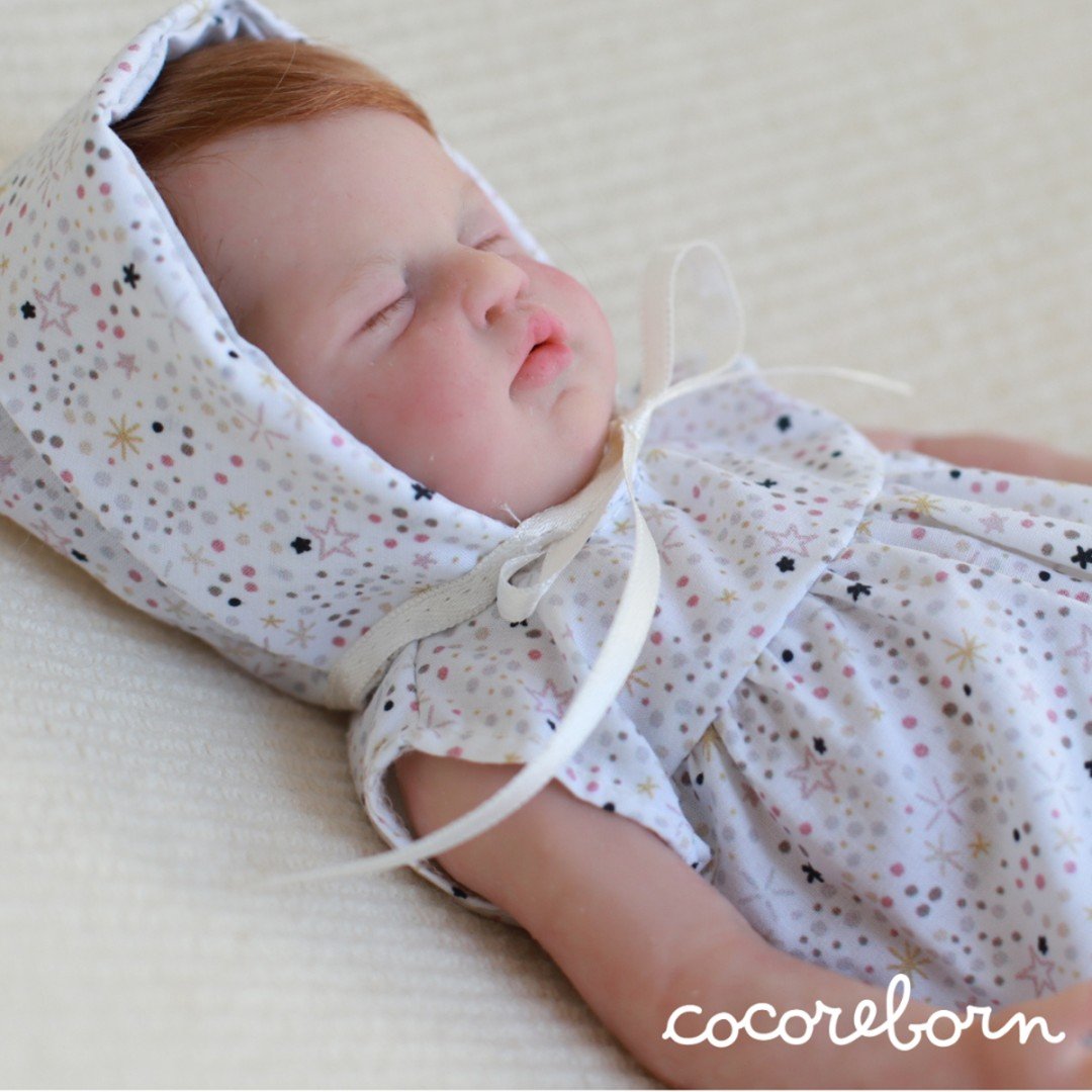 Allie, a girl with brown hair and closed eyes
