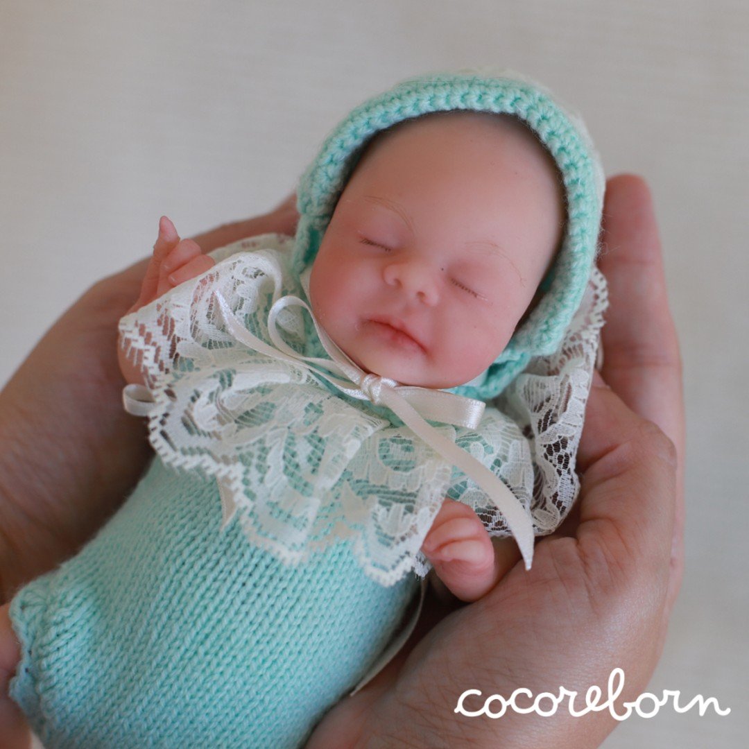 Mini Wren, a boy with closed eyes